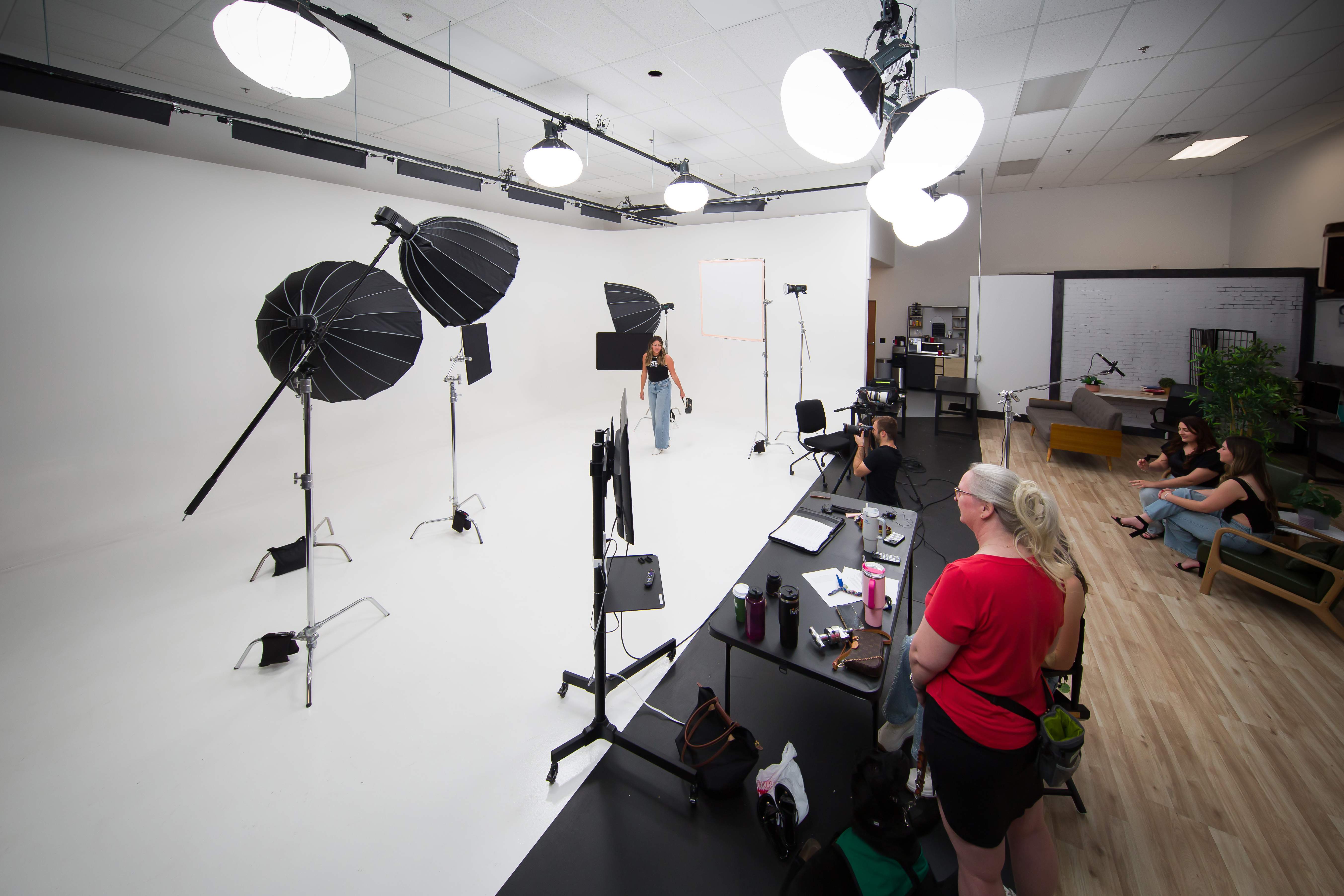 Billy Hardiman capturing marketing campaign photography in a large studio in Chandler