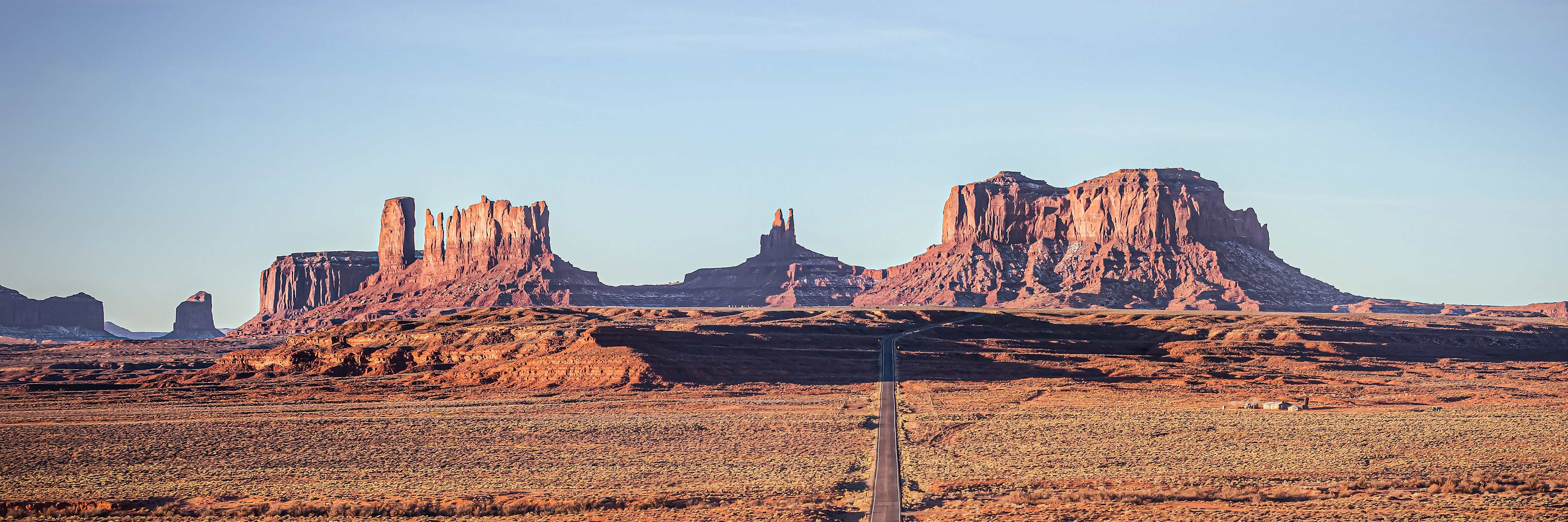 Iconic road leading to Monument Valley rock formations from Forrest Gump Point in Utah