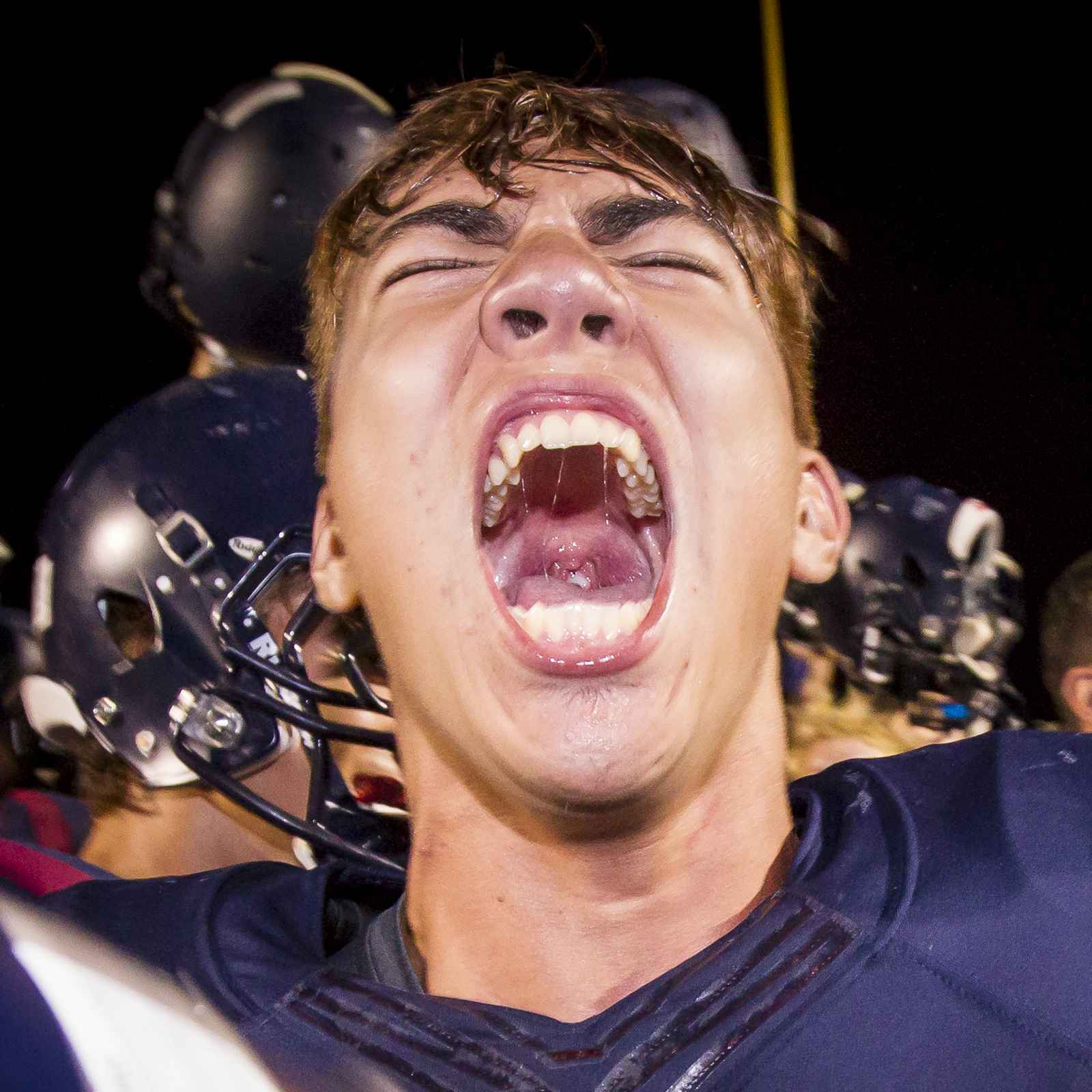 Emotional celebration of football player after game at Perry High School in Gilbert, AZ