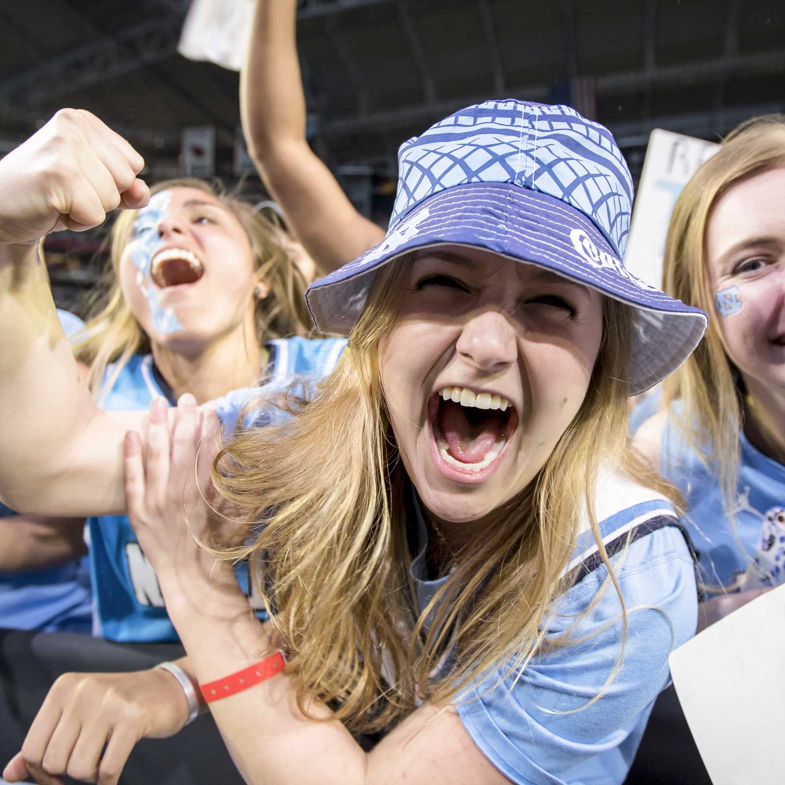 Excited North Carolina fan flexing and cheering during 2017 NCAA Final Four