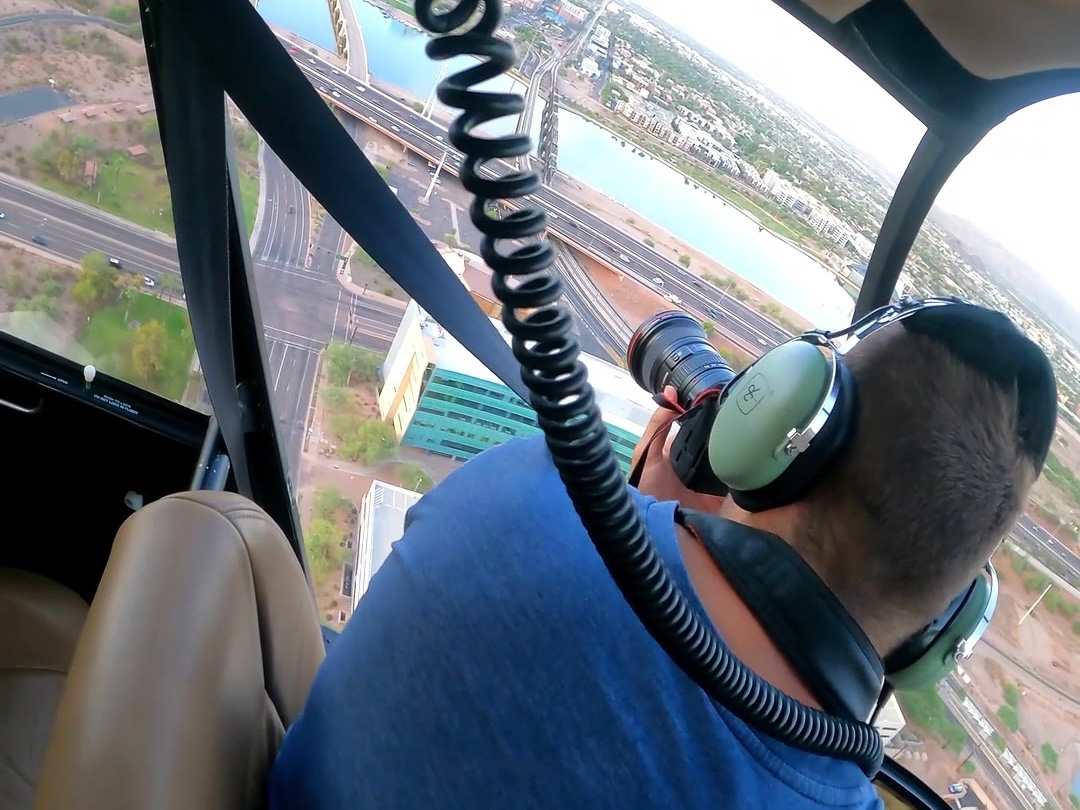 Billy Hardiman photographing from R-44 helicopter over Tempe Town Lake