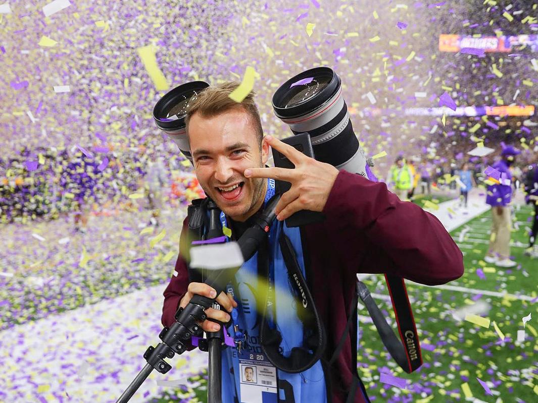 Billy Hardiman working as a sports photographer during the championship game